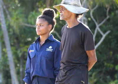 Reef Authority staff and Traditional Owner