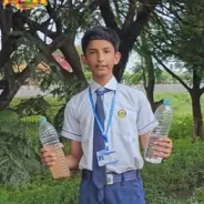 Student holding water bottles